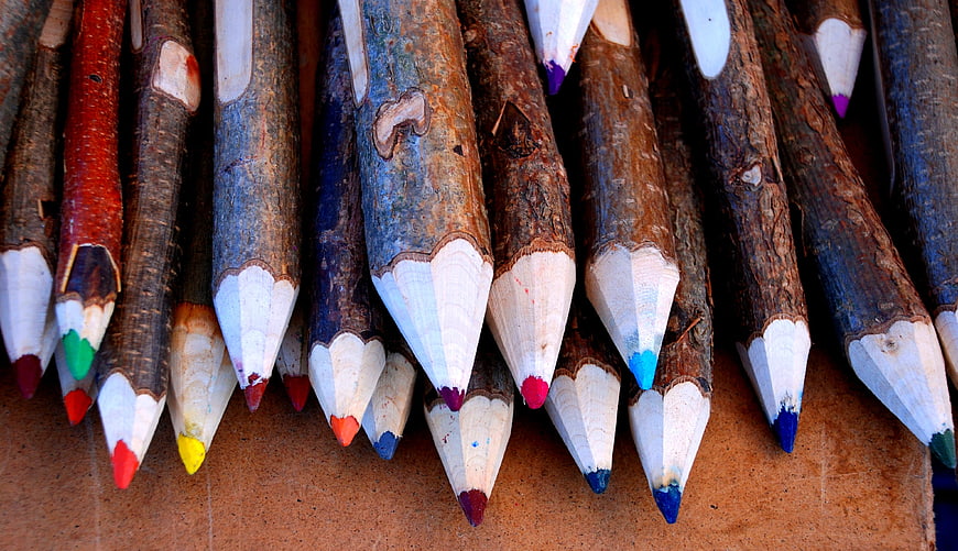 Rustic handmade wooden colored pencils close up