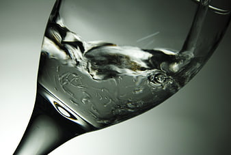 Close-up of swirling clear water in a glass