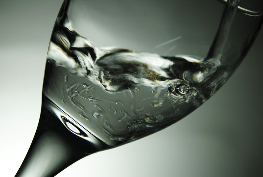 Close-up of swirling clear water in a glass