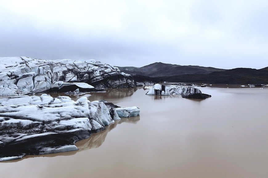 Glacier Lagoon with Icebergs and Mountains in Iceland