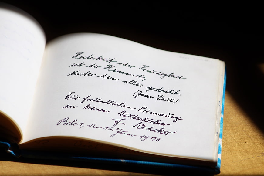 Vintage handwritten German poem in an old notebook