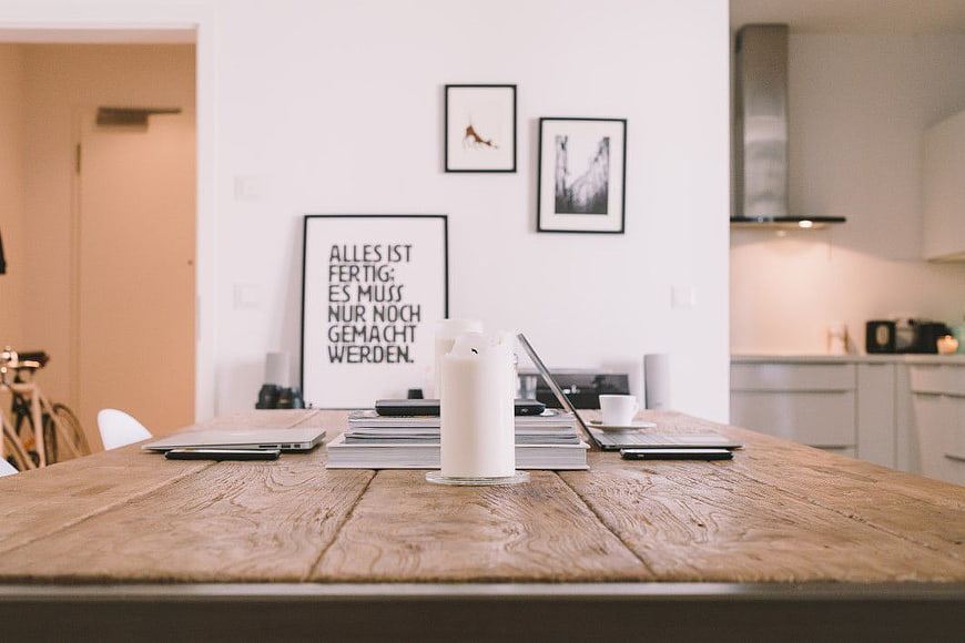 Minimalist Wooden Desk with Laptop and Books
