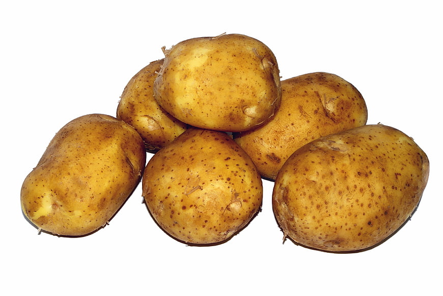 Fresh Brown Potatoes Clustered On White Background