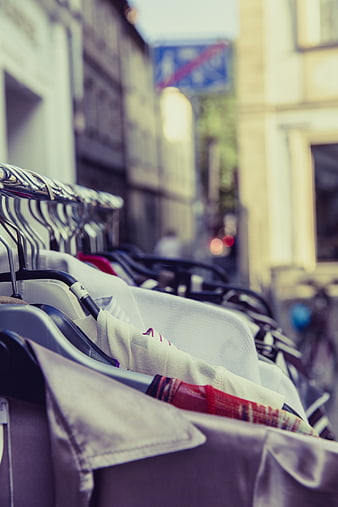 Clothing on Hangers in Outdoor Street Market Setting