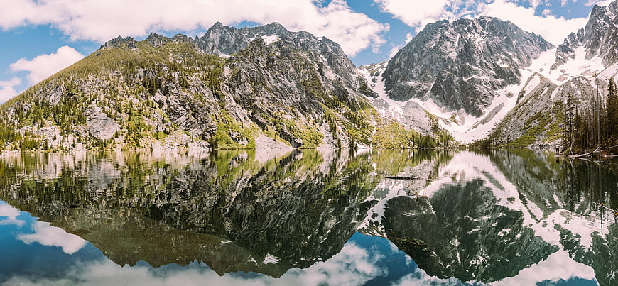 Majestic Mountain Lake Reflection with Snowy Peaks