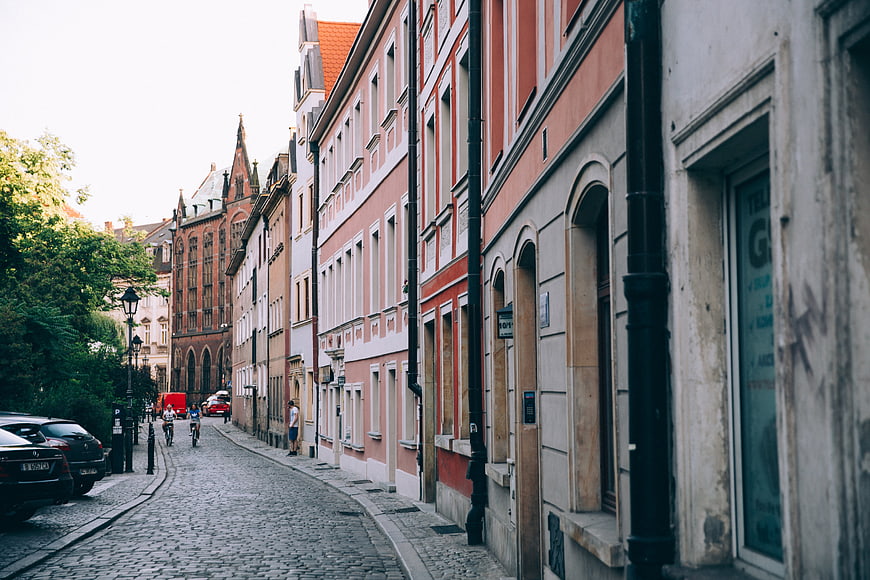 Cobblestone Street in Historic European City with Colorful Buildings