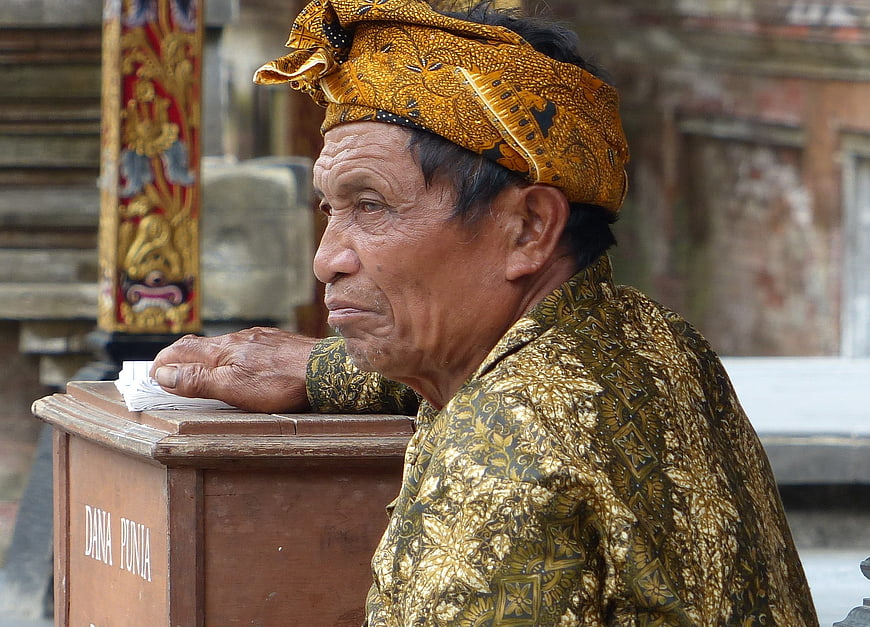Elderly Balinese Man in Traditional Batik Attire