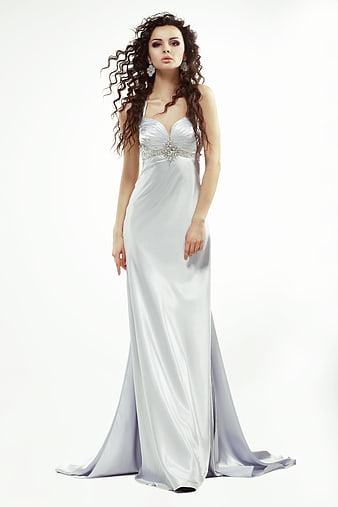 Woman in Elegant Silver Evening Gown