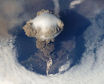 Aerial View of Volcanic Eruption with Ash Plume