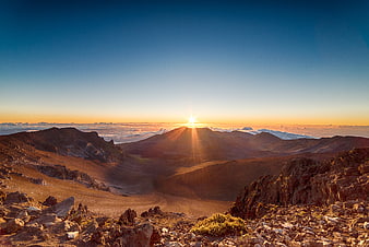 Sunrise Over Volcanic Crater With Sea of Clouds