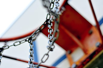 Close-up of metal chains on a basketball hoop