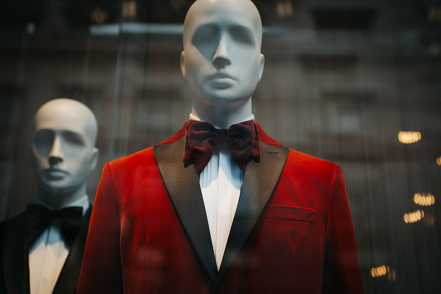 Red velvet tuxedo on mannequin in shop window