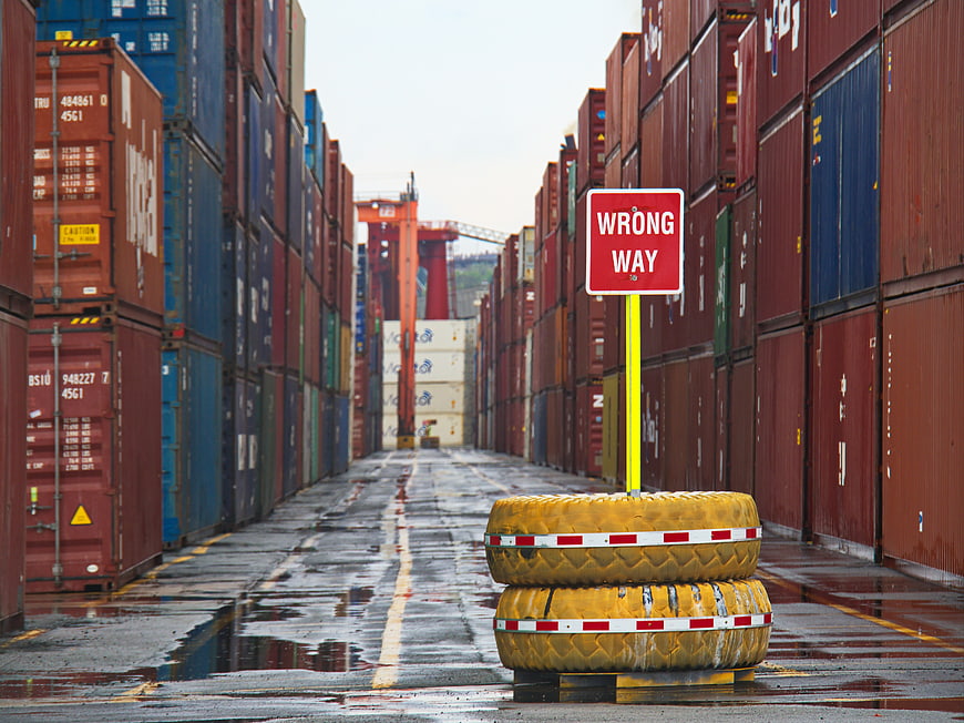 Wrong Way Sign in Shipping Container Yard