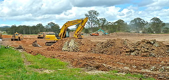 Heavy Excavators and Earthmoving Equipment at Active Construction Site