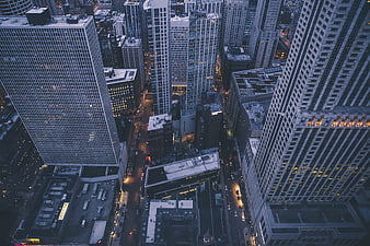 Aerial View of Downtown City Skyline at Dusk