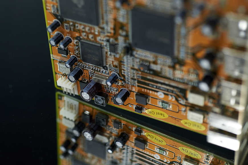 Close-up of electronic circuit board with reflection