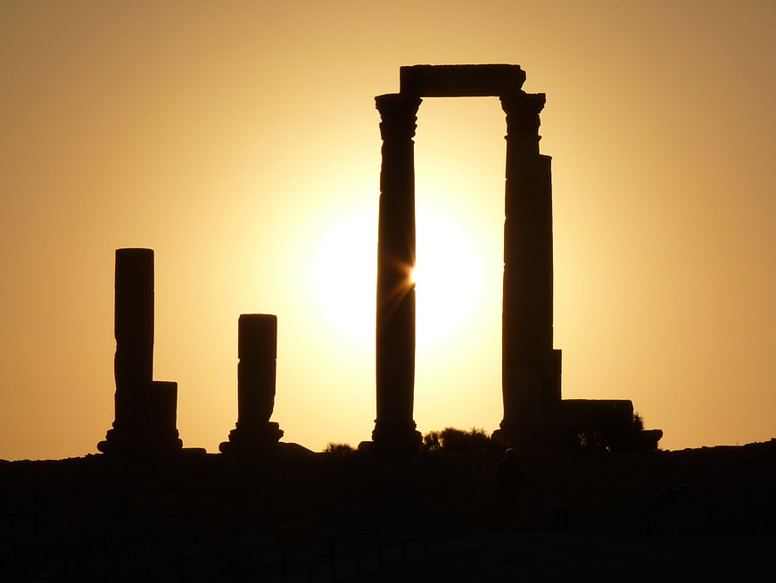 Silhouette of ancient columns at sunset in Amman, Jordan