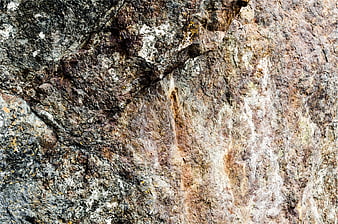 Close-up texture of rough granite rock surface