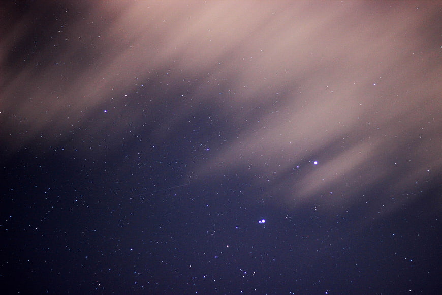 Night Sky with Stars and Wispy Clouds