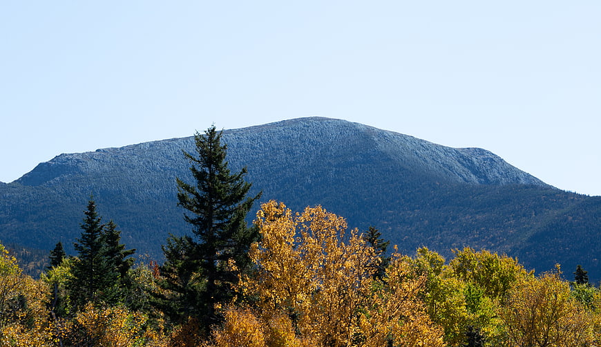 Autumn Mountain Landscape with Golden Foliage and Blue Sky