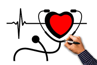 Hand drawing heart with stethoscope and pulse line