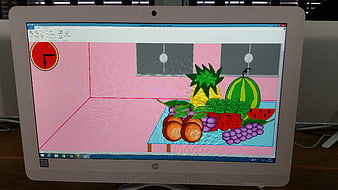 Digital drawing of fruit still life on computer monitor
