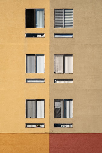 Colorful Modern Apartment Building Facade with Symmetrical Windows