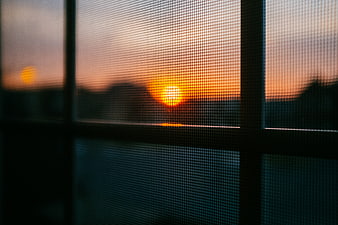 Sunset View Through Window Screen Mesh