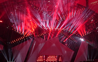 Dramatic red laser light show on concert stage
