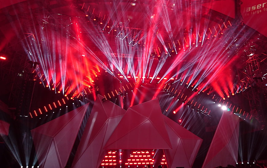 Dramatic red laser light show on concert stage