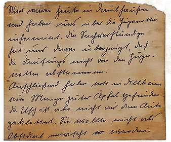 Vintage handwritten German letter on aged torn paper