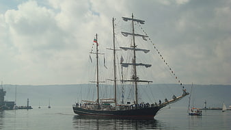 Historic Tall Ship Sailing in Harbor with Bulgarian Flag