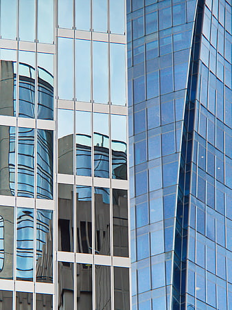 Modern Glass Skyscraper Facade with Reflections