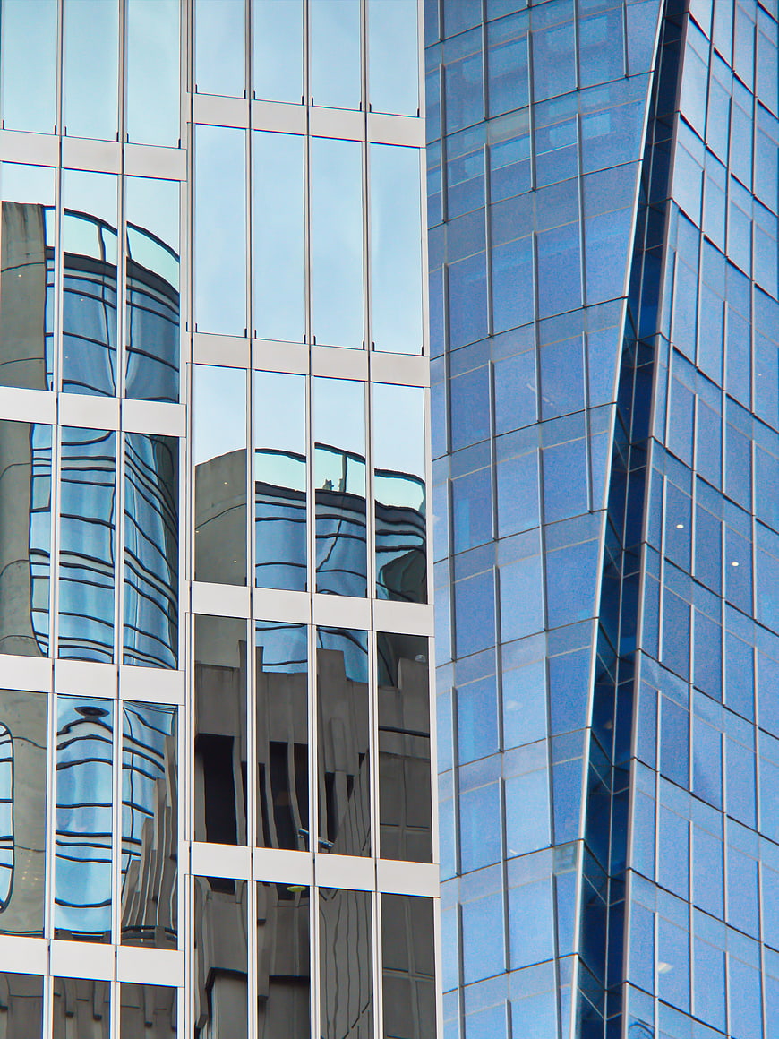 Modern Glass Skyscraper Facade with Reflections