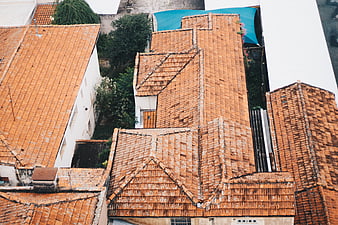 Aerial view of traditional terracotta tiled roofs in a European village