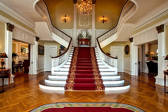 Grand Historic Mansion Foyer with Red Carpet Staircase