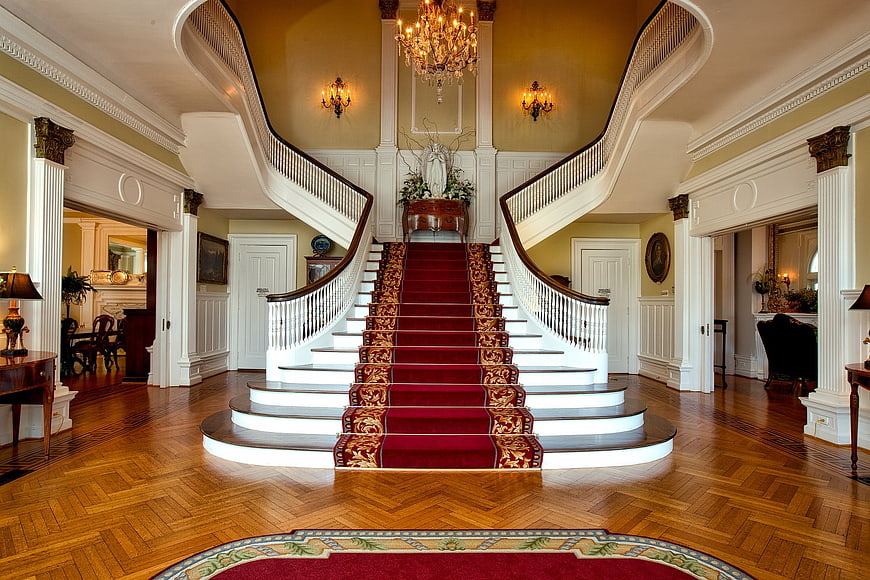 Grand Historic Mansion Foyer with Red Carpet Staircase