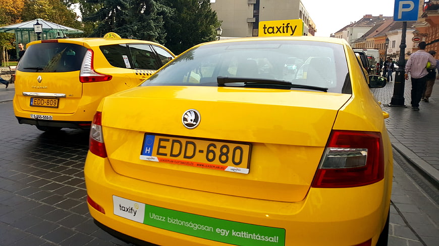 Yellow Taxi Cars Parked on City Street