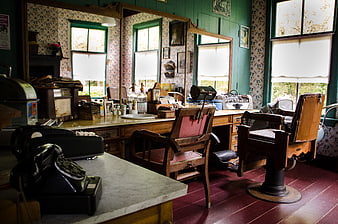 Vintage Barbershop Interior with Antique Chairs and Tools