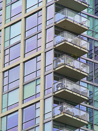 Modern Apartment Building Facade with Glass Balconies