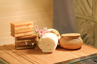 Spa Massage Bar Soap and Towel on Bamboo Mat