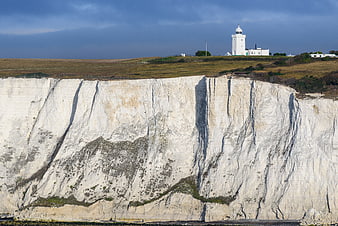White Cliffs of Dover with Lighthouse and Dramatic Sky