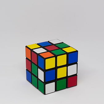 Classic 3x3 Rubik's Cube Puzzle on White Background