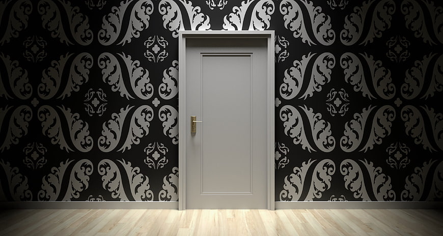 Closed Gray Door In Dark Damask Wallpaper Interior
