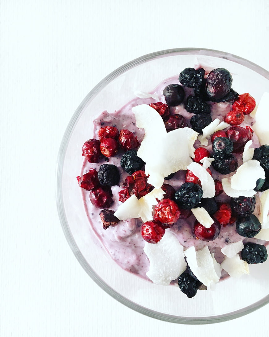 Top View Berry Yogurt Bowl with Coconut Flakes