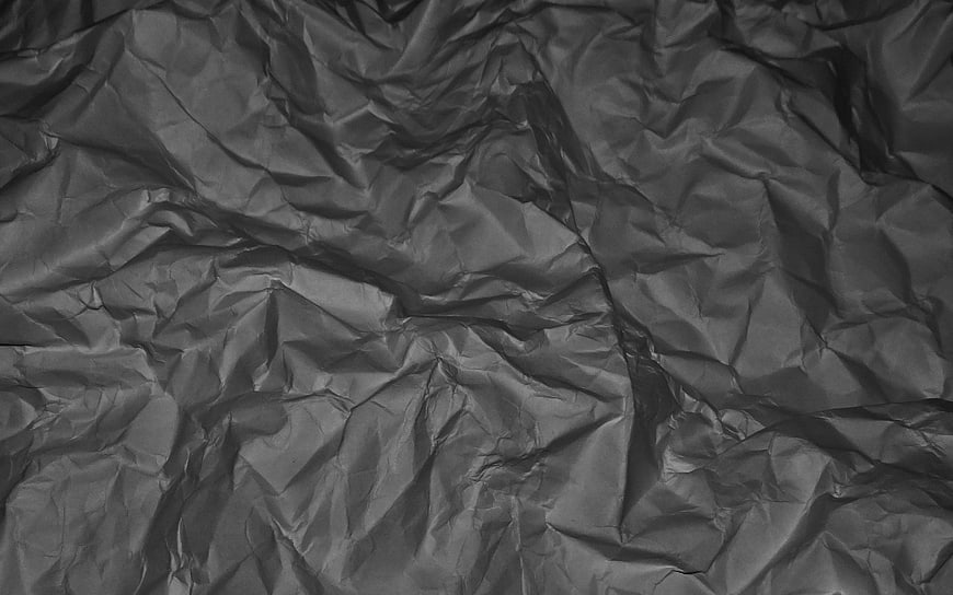 Crumpled Black Paper Texture Background