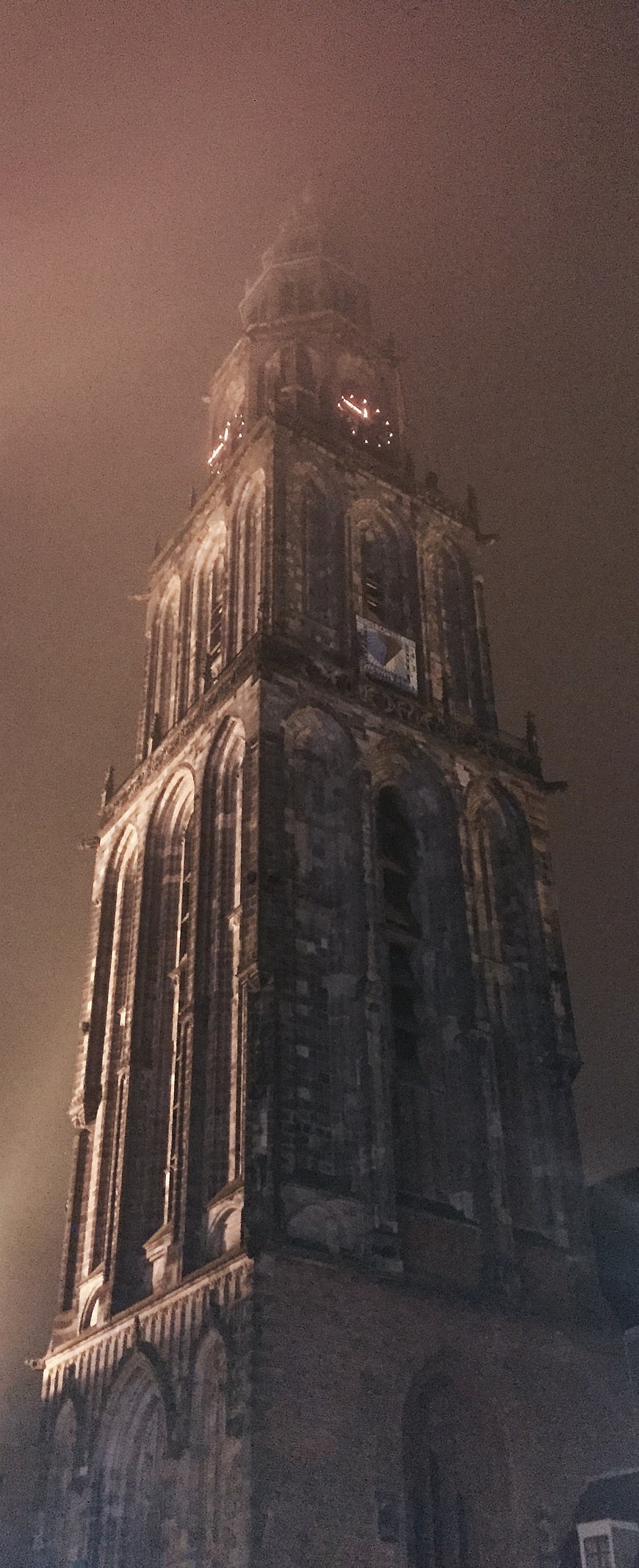 Martinitoren Groningen illuminated in fog at night