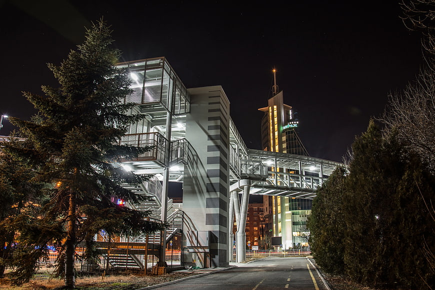 Modern Pedestrian Bridge and Tower at Night