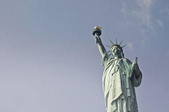 Statue of Liberty against blue sky