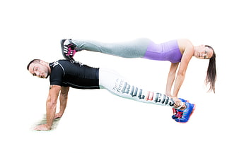 Couple performing acro yoga plank pose on white background